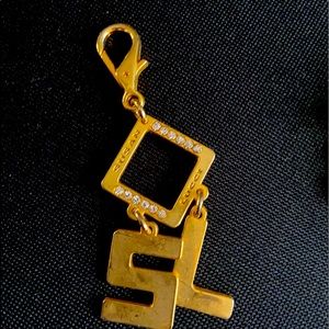 Susan Lucci purse handing pendant